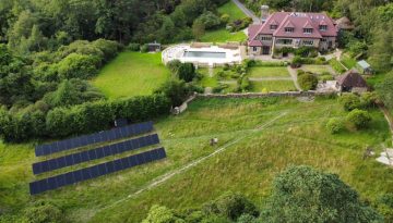 Modern UK home with solar panels and battery storage system